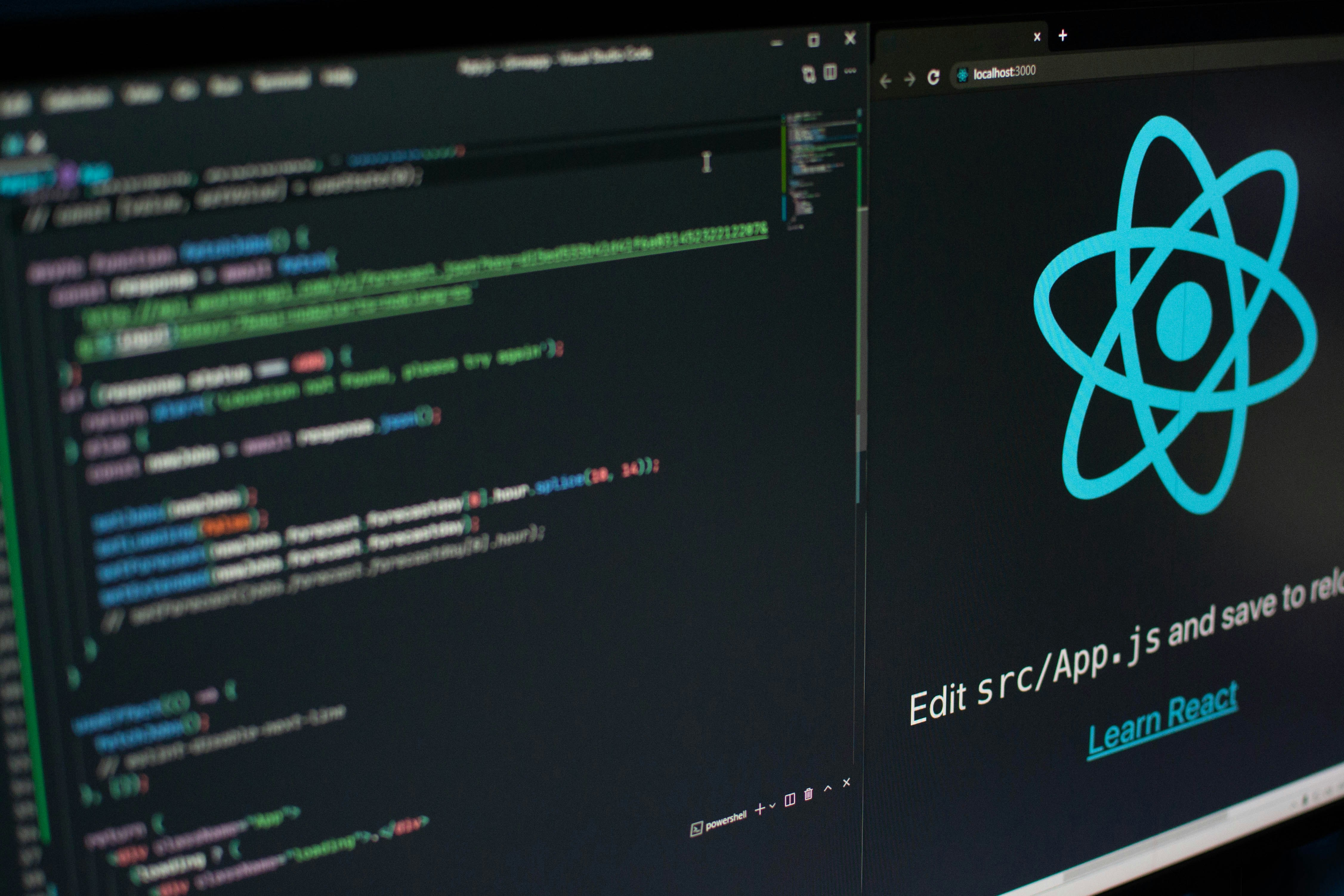 A close-up view of a computer screen displaying colorful lines of programming code on the left and the React logo on the right, representing modern web development.