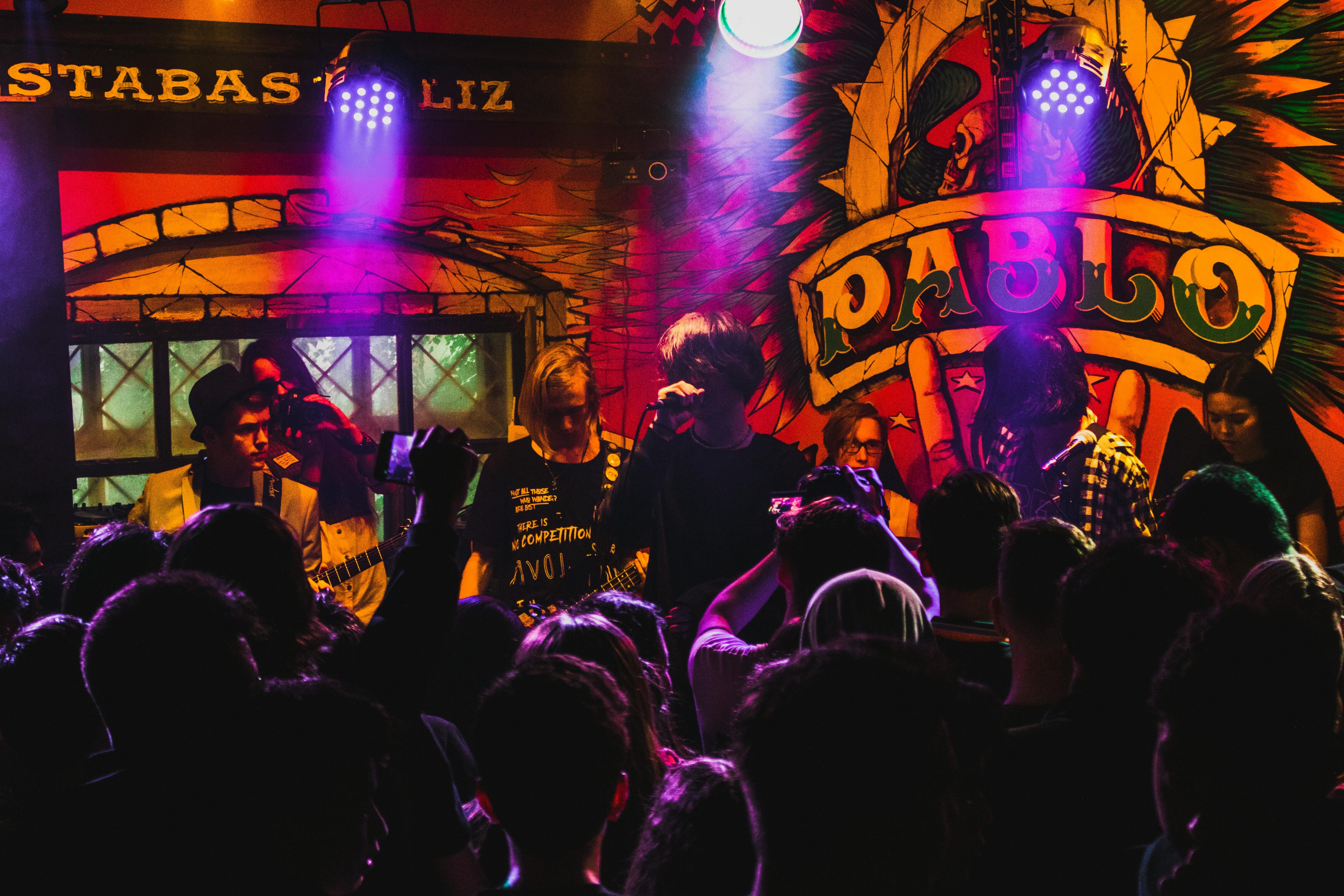 Band playing in a small indoor venue
