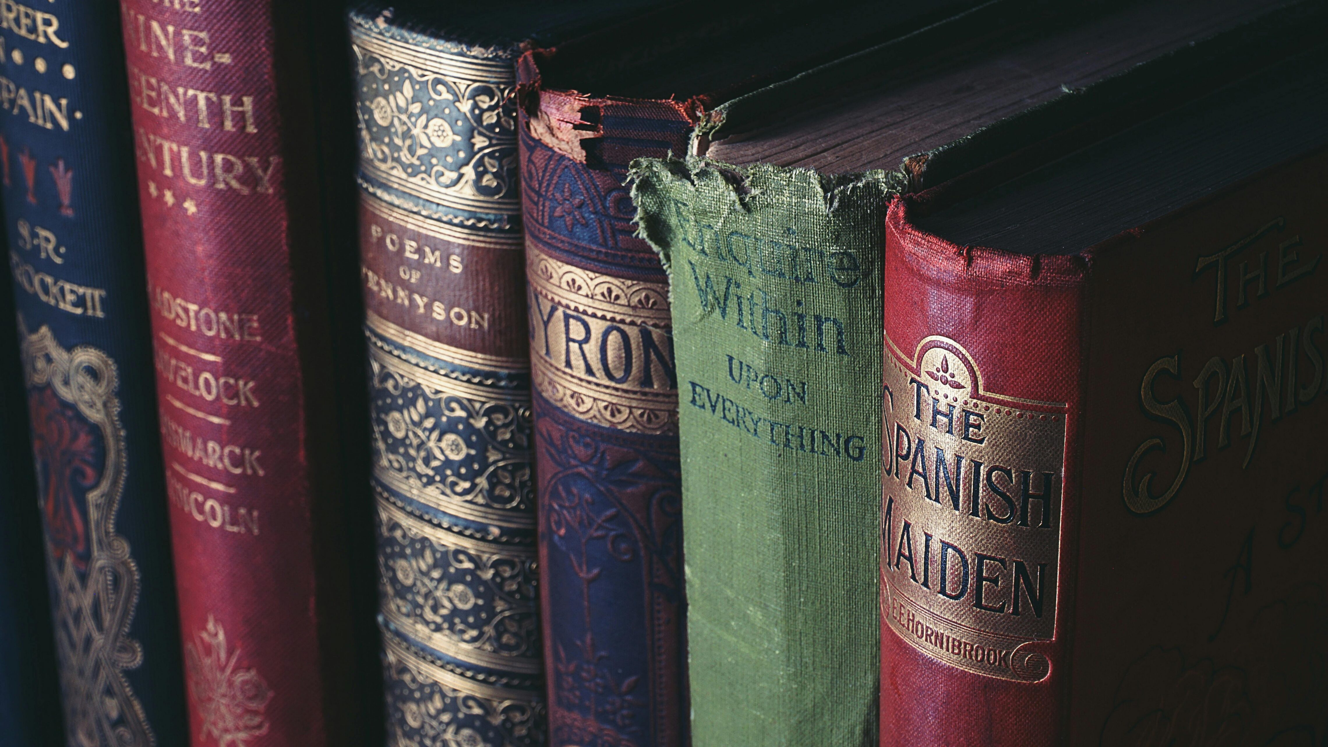 The spines of a few old books