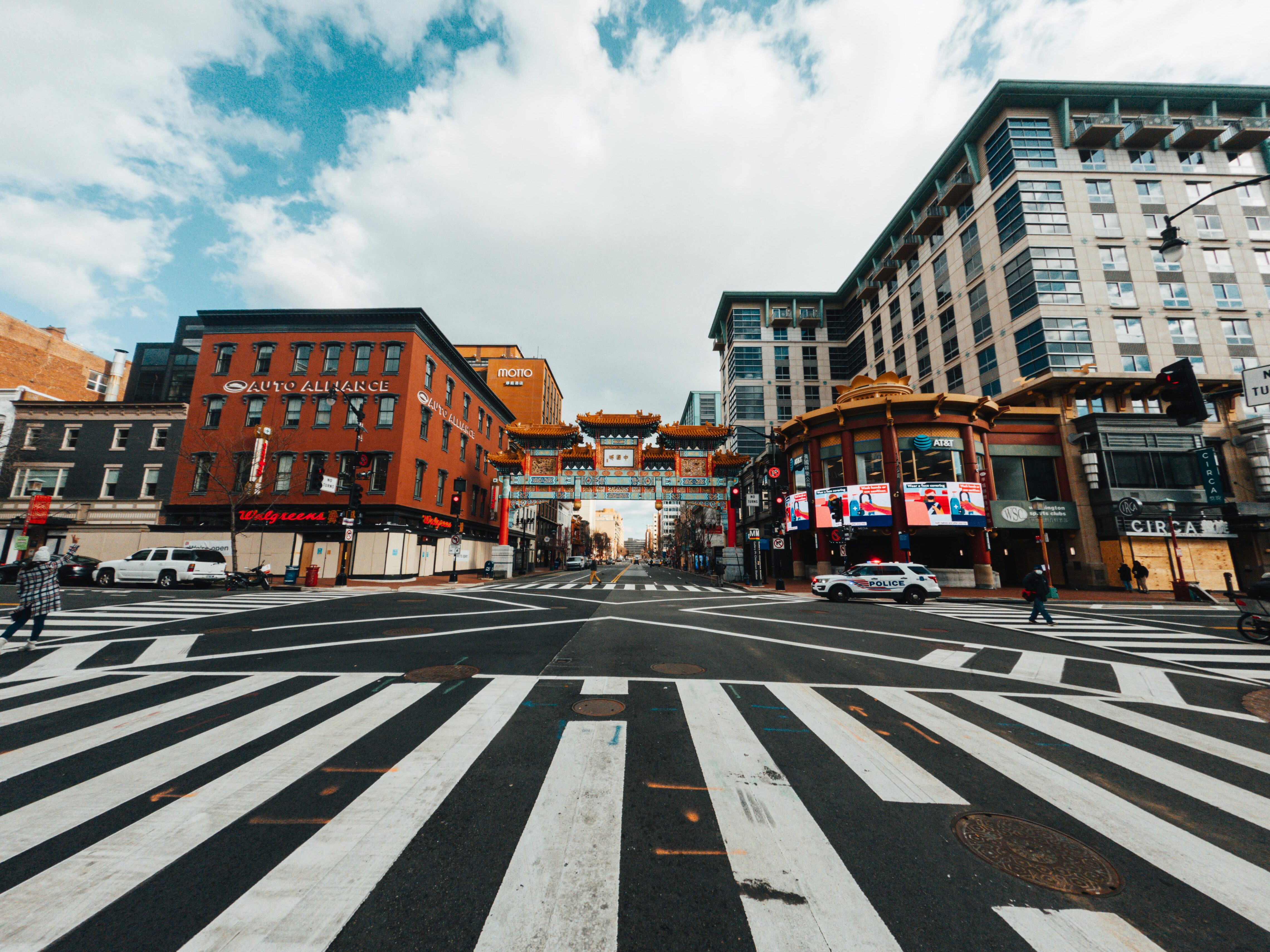 An urban street crowded with different types of buildings