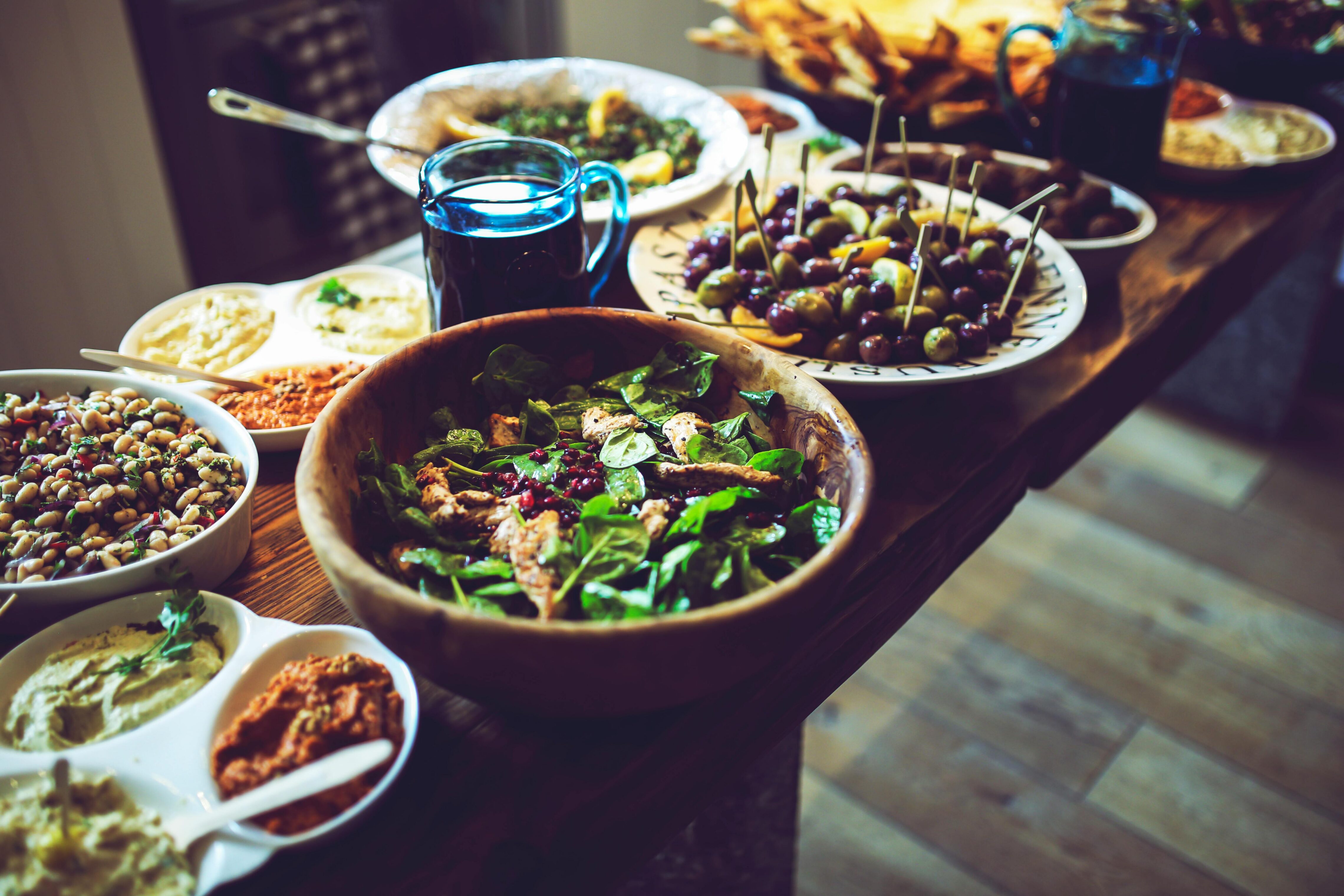 A spread of diverse, healthy foods on a table