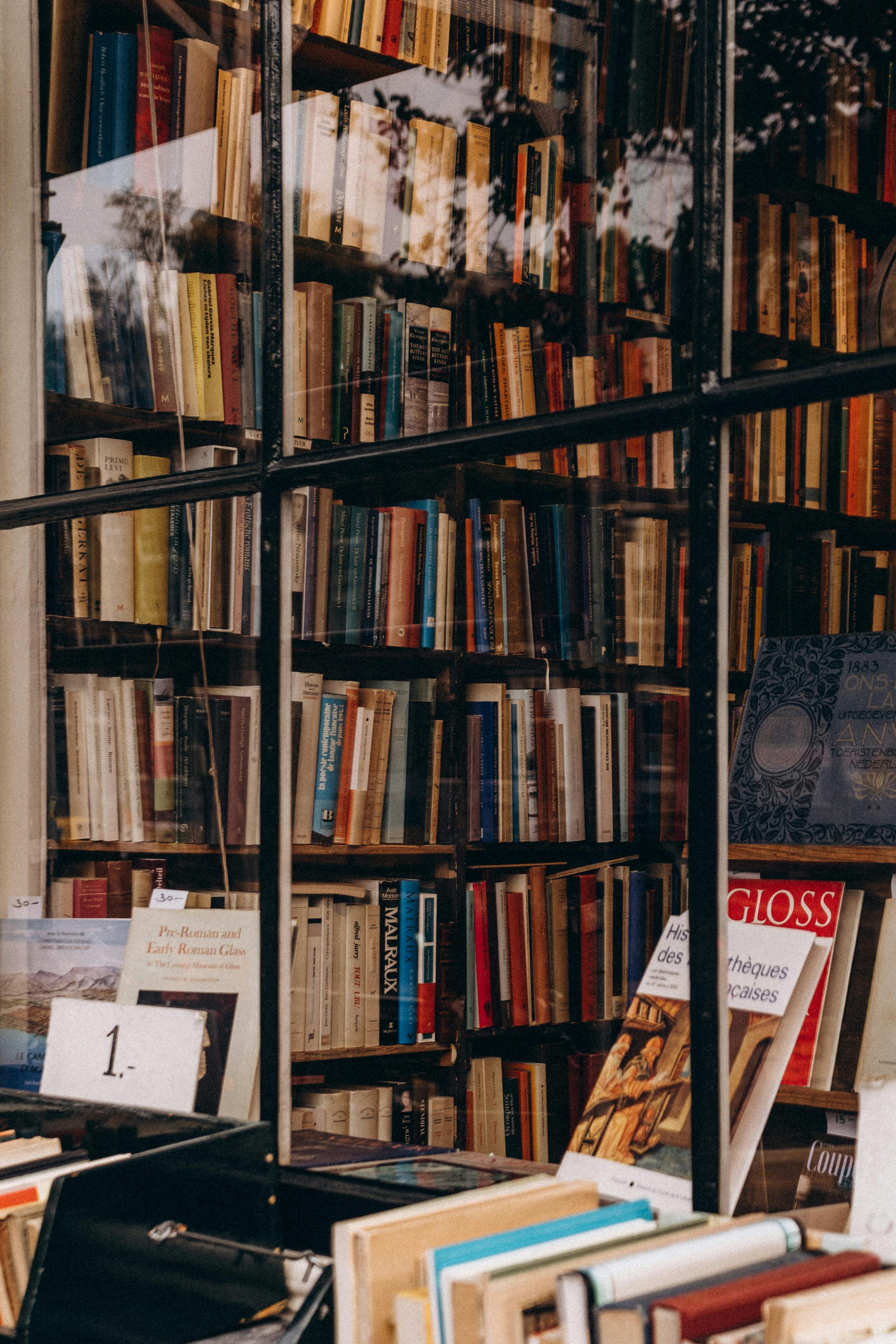 A bookstore window where a book on architecture is visible